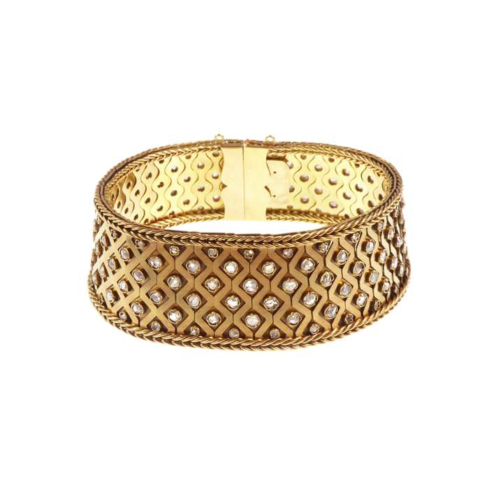 Diamond studded gold ribbon strap bracelet